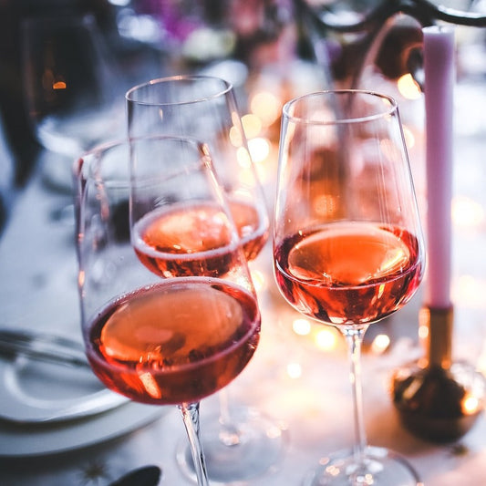 glasses of rose wine on a table