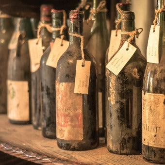 a picture of some old wine bottles
